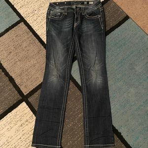 Women’s Miss Me straight leg jeans.